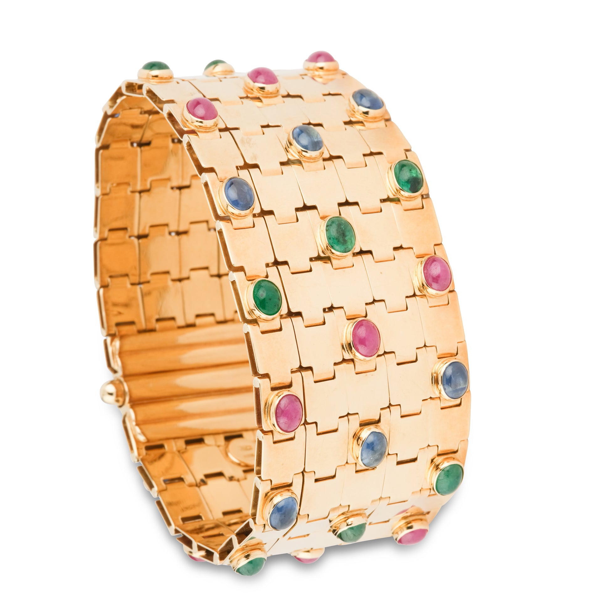 Un bracelet vintage signé Mario di Meola en or jaune et cabochon d'émeraudes, rubis et saphirs