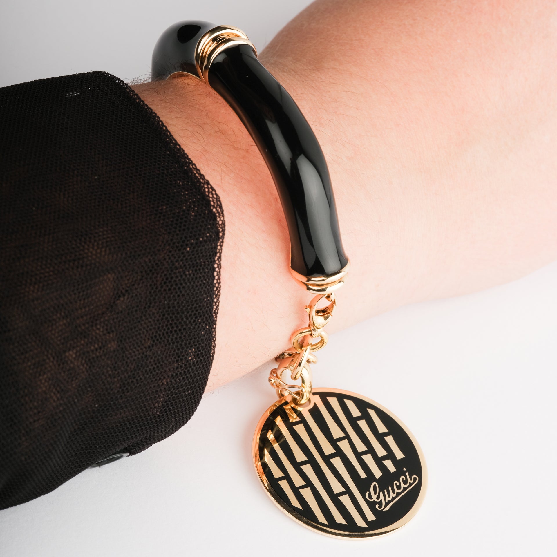 Bracelet Gucci en or jaune 18K et émail noir