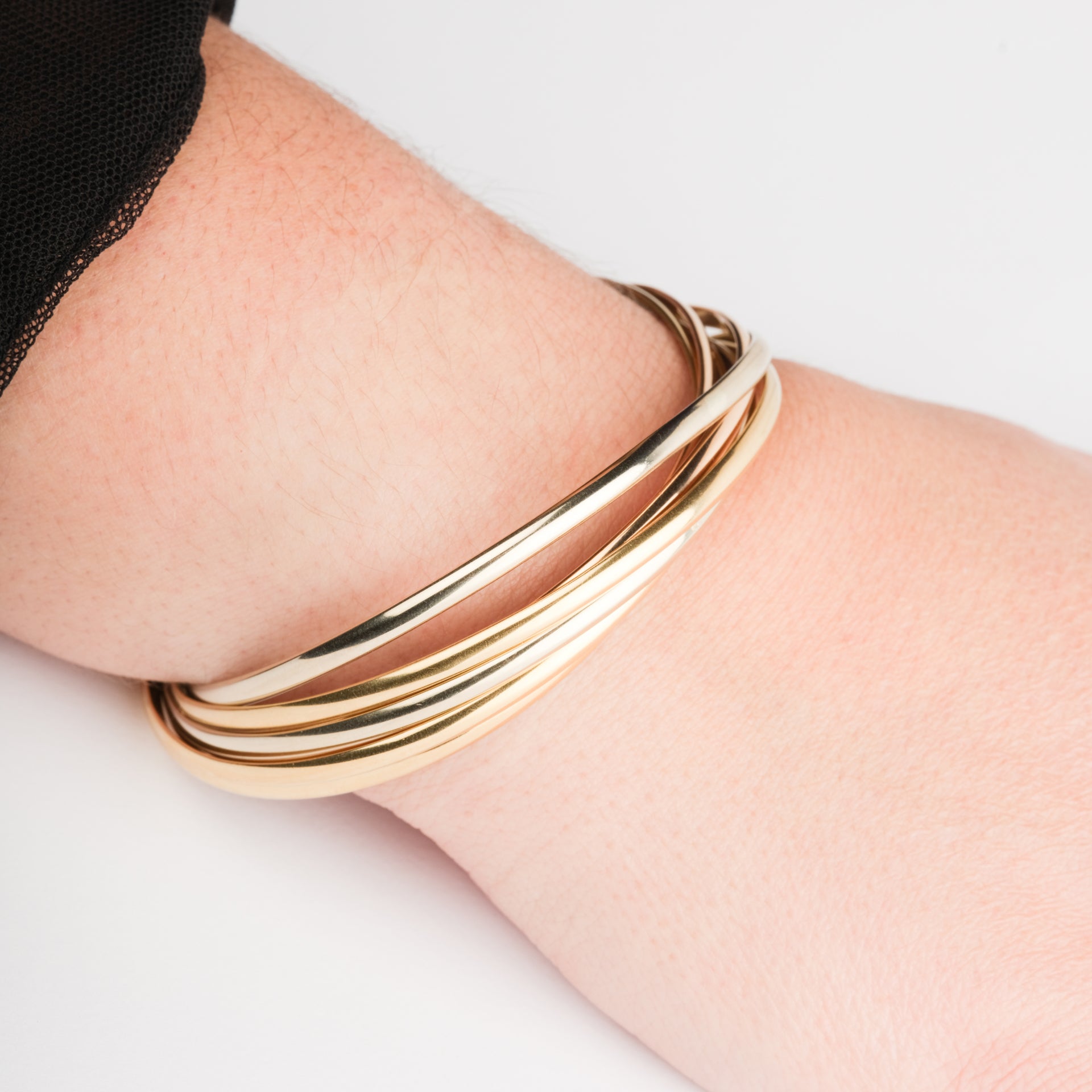 Cartier, a "Trinity" bracelet, week-old.