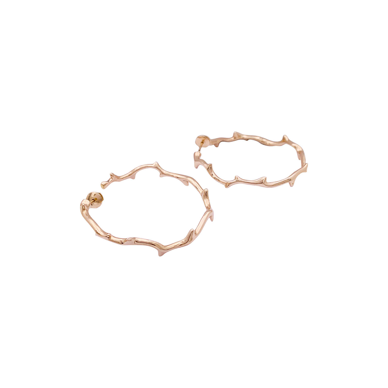 Boucles d'oreilles Dior, "Bois de Rose", or rose.