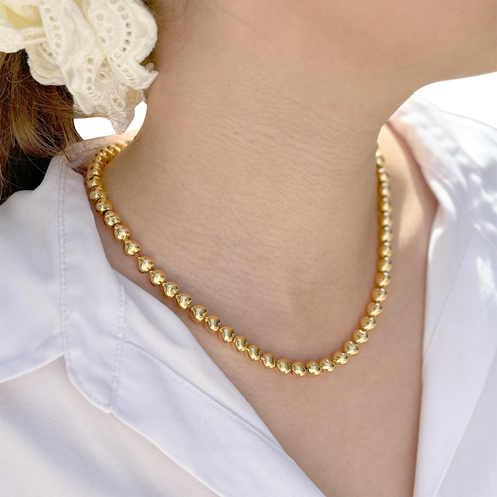 Collier « Cœurs » or jaune.