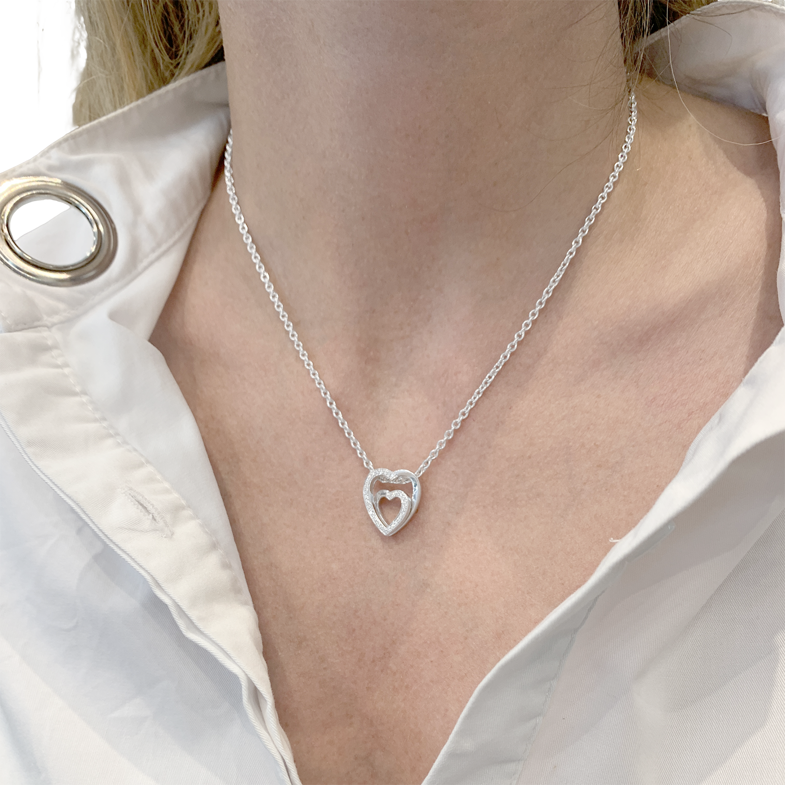 Collier Cartier, "Coeurs", or blanc, diamants.