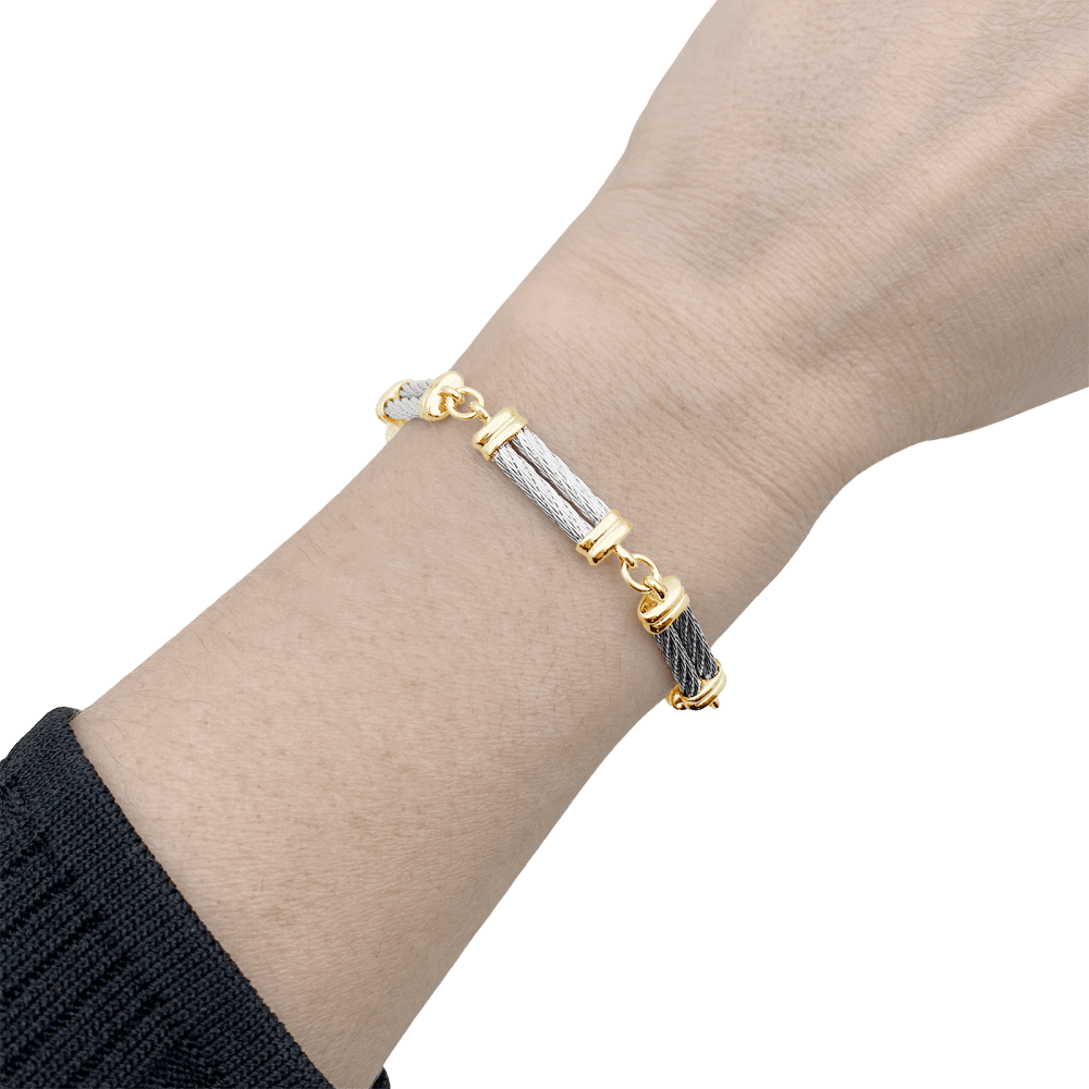 Photo du Bracelet Fred vintage porté au poignet "Force 10", en or jaune, acier