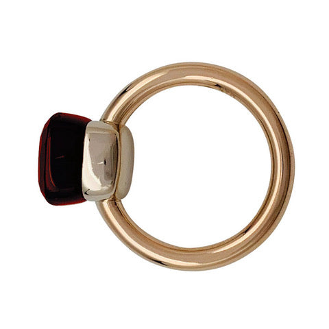 Pomellato ring, "Nudo Classic", two golds and garnet.
