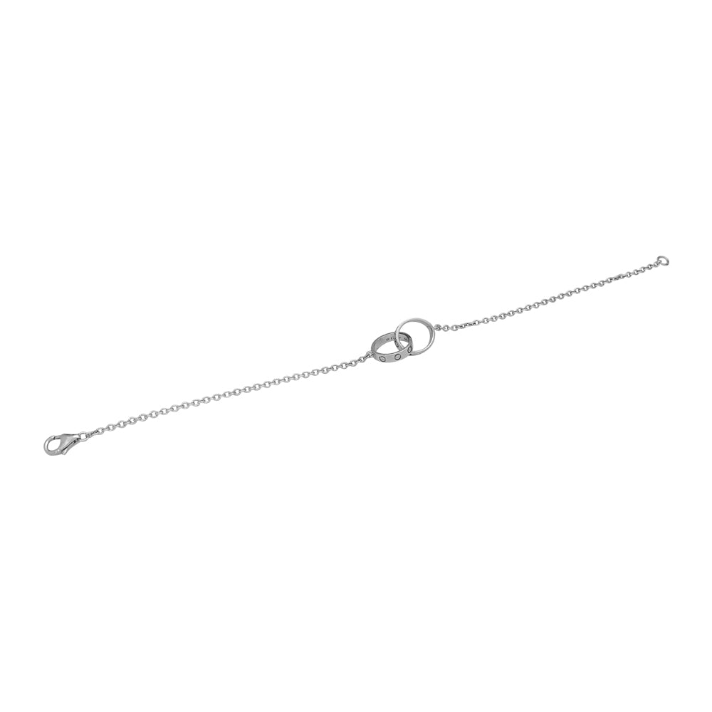 Bracelet souple Cartier, "Love", or blanc.