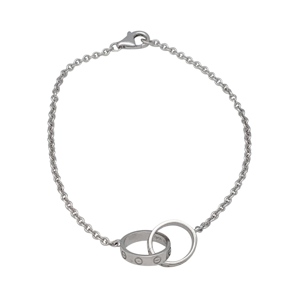 Bracelet souple Cartier, "Love", or blanc.