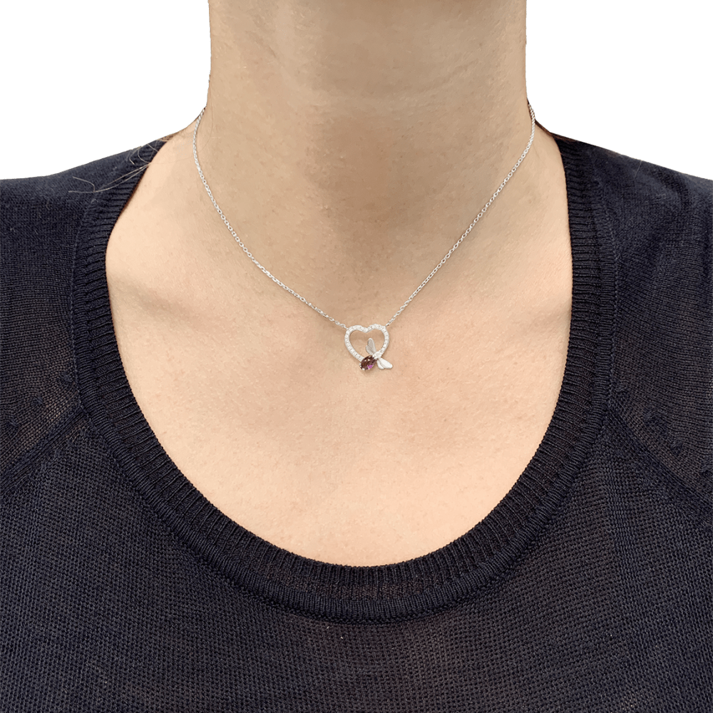 Collier Chaumet, « Attrape-moi si tu m’aimes », or blanc, améthyste, diamants.