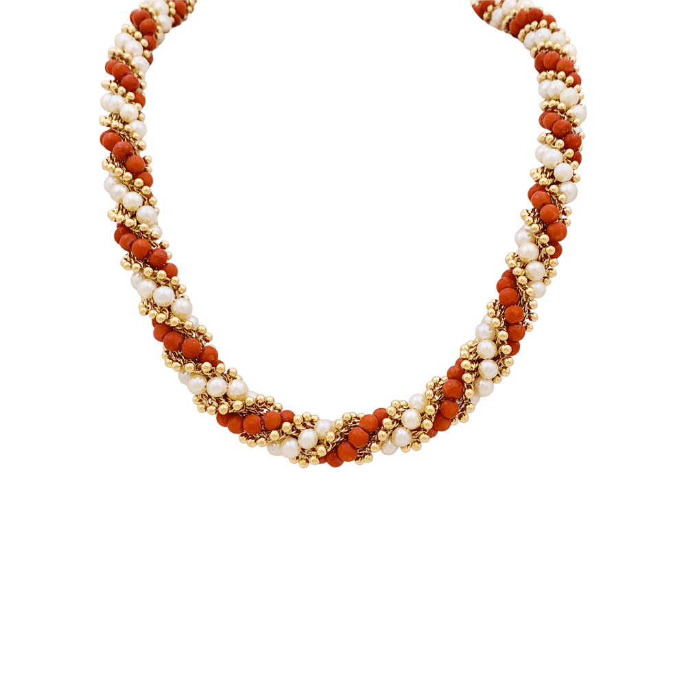 Collier-Sautoir Van Cleef & Arpels, "Twist", or jaune, corail, perles.