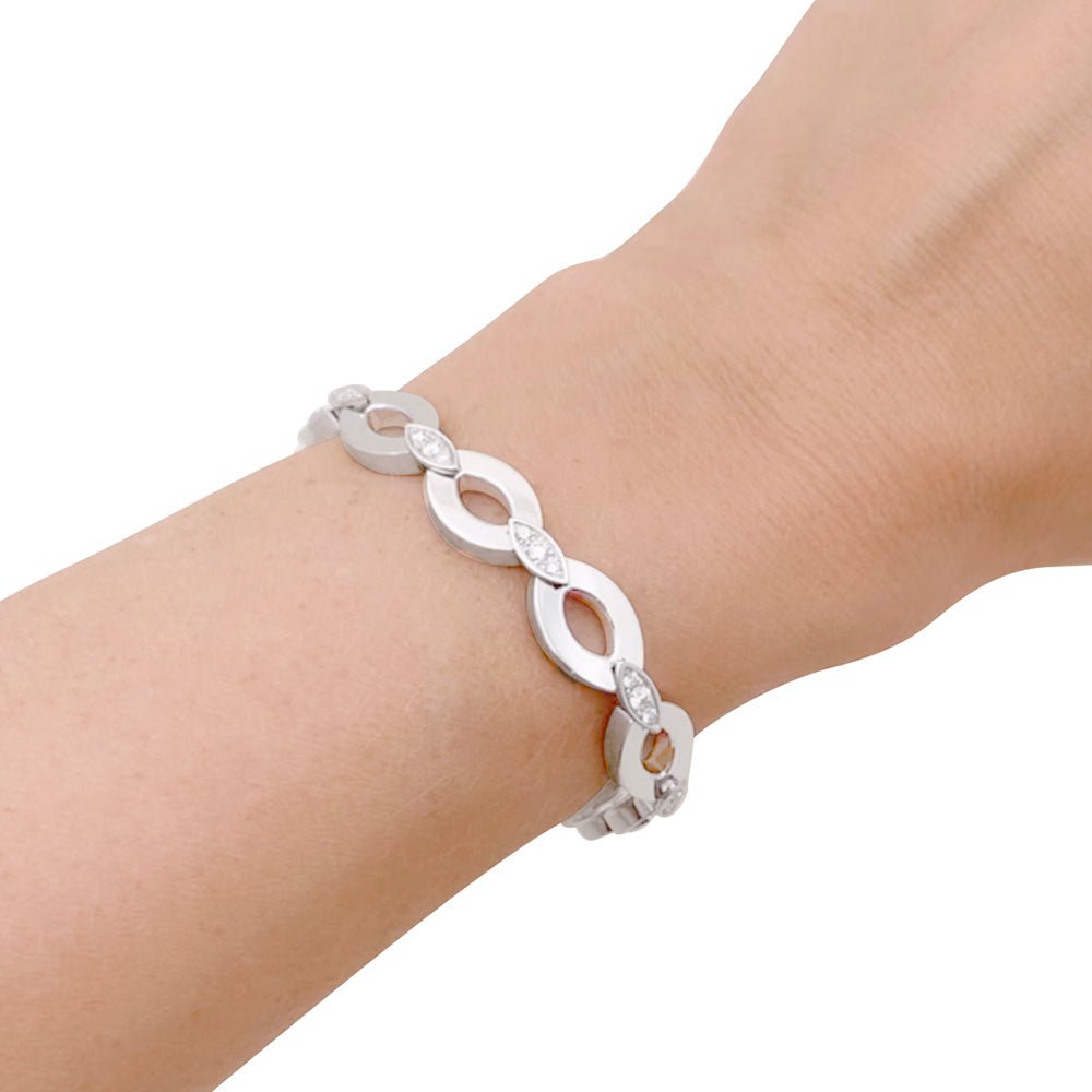 Bracelet Cartier "Diadéa" or blanc, diamants. - Maison Eloe