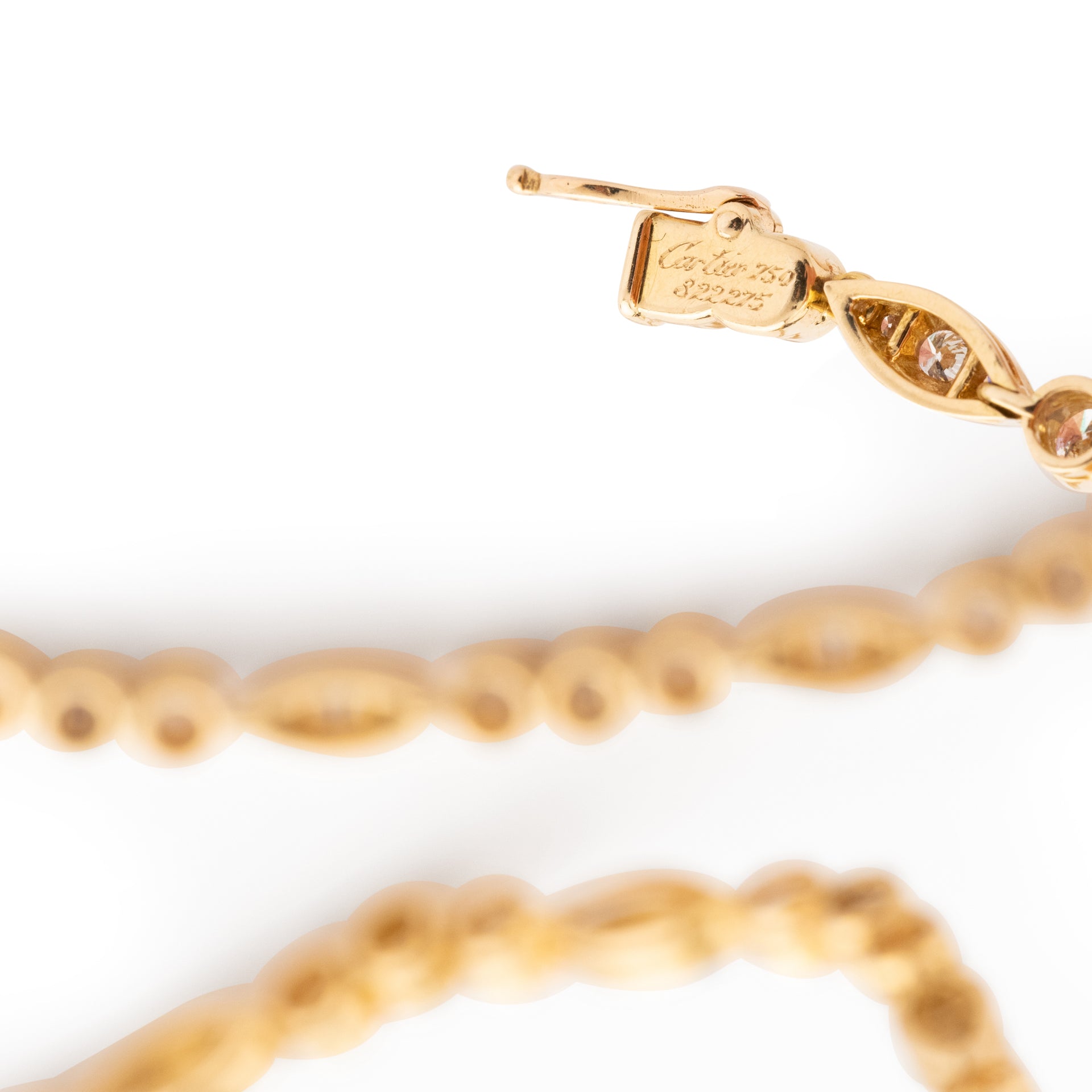 Cartier necklace in 18K yellow gold and diamonds.