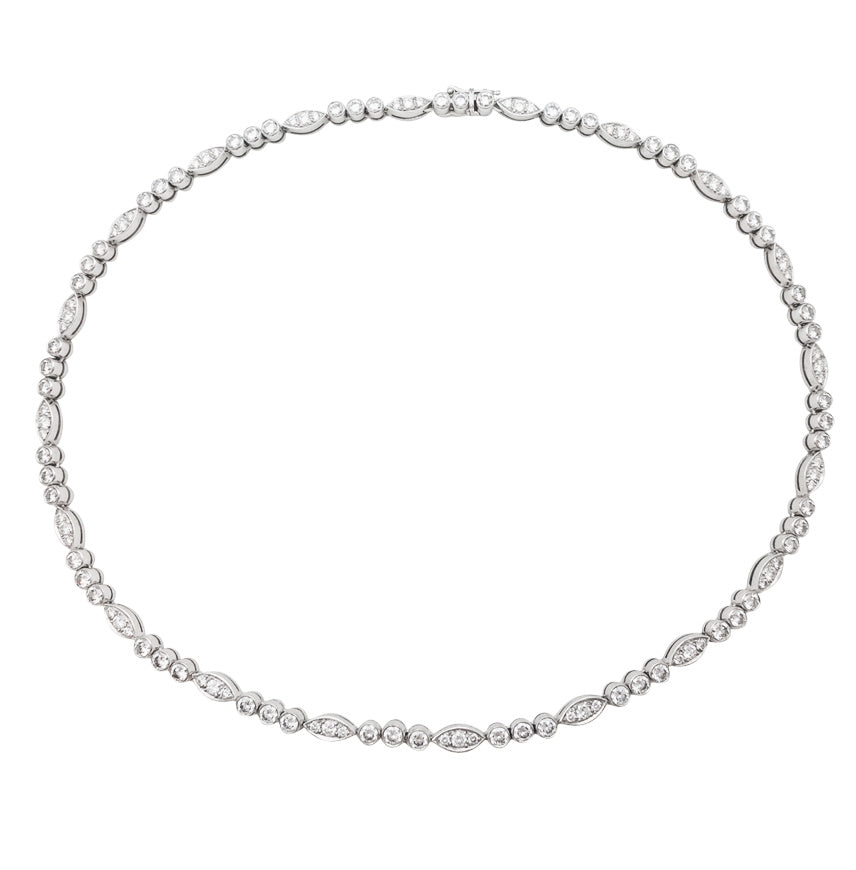 Cartier "Dentelle" necklace in platinum, white gold and diamonds.