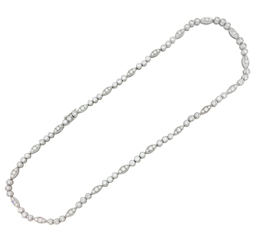 Cartier "Dentelle" necklace in platinum, white gold and diamonds.