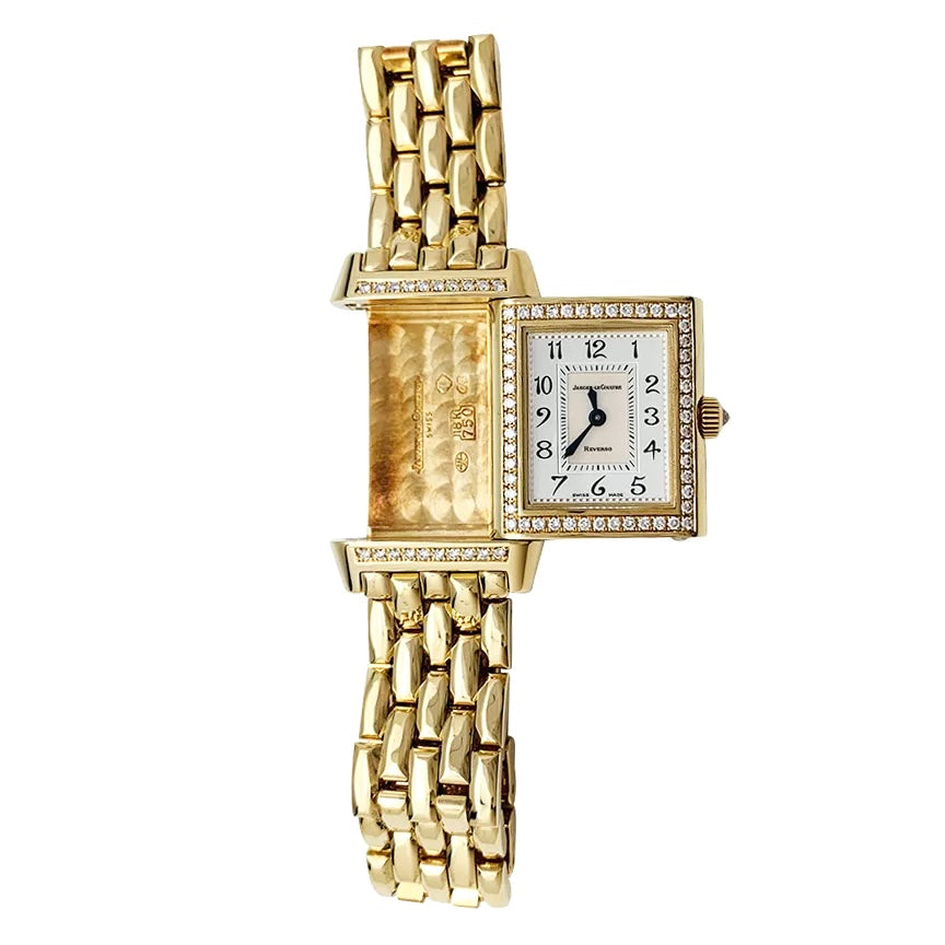 Montre Jaeger Lecoultre "Reverso Duetto" en or jaune, nacre et diamants.