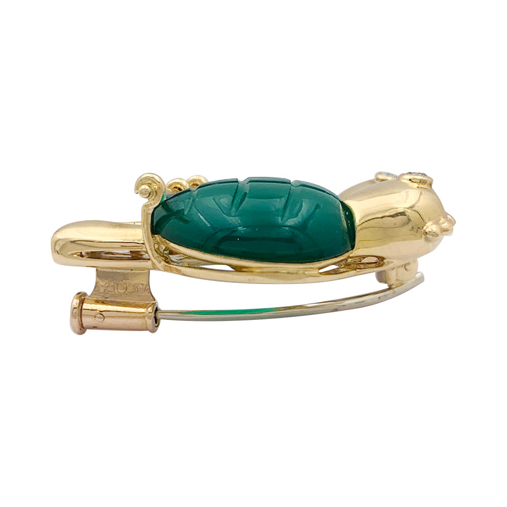 Broche Cartier "Inséparables" or jaune, diamants, pierres de couleur.