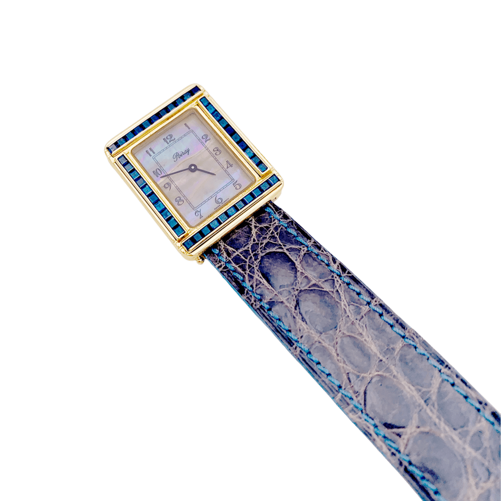 Montre Poiray, "Ma Première", or jaune, nacre, saphir, cuir. - Maison Eloe