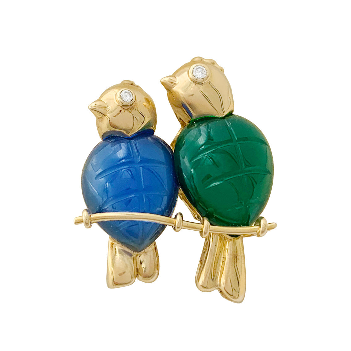 Broche Cartier "Inséparables" or jaune, diamants, pierres de couleur.