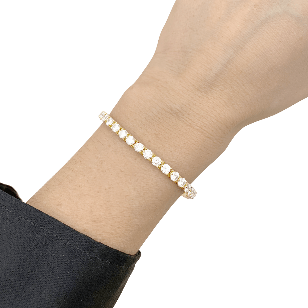 Bracelet ligne Cartier, or jaune et diamants. - Maison Eloe