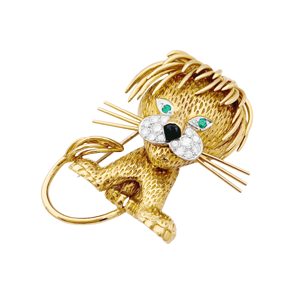 Clip Van Cleef & Arpels, "Lion Ebouriffé", or jaune, émeraude, diamants.
