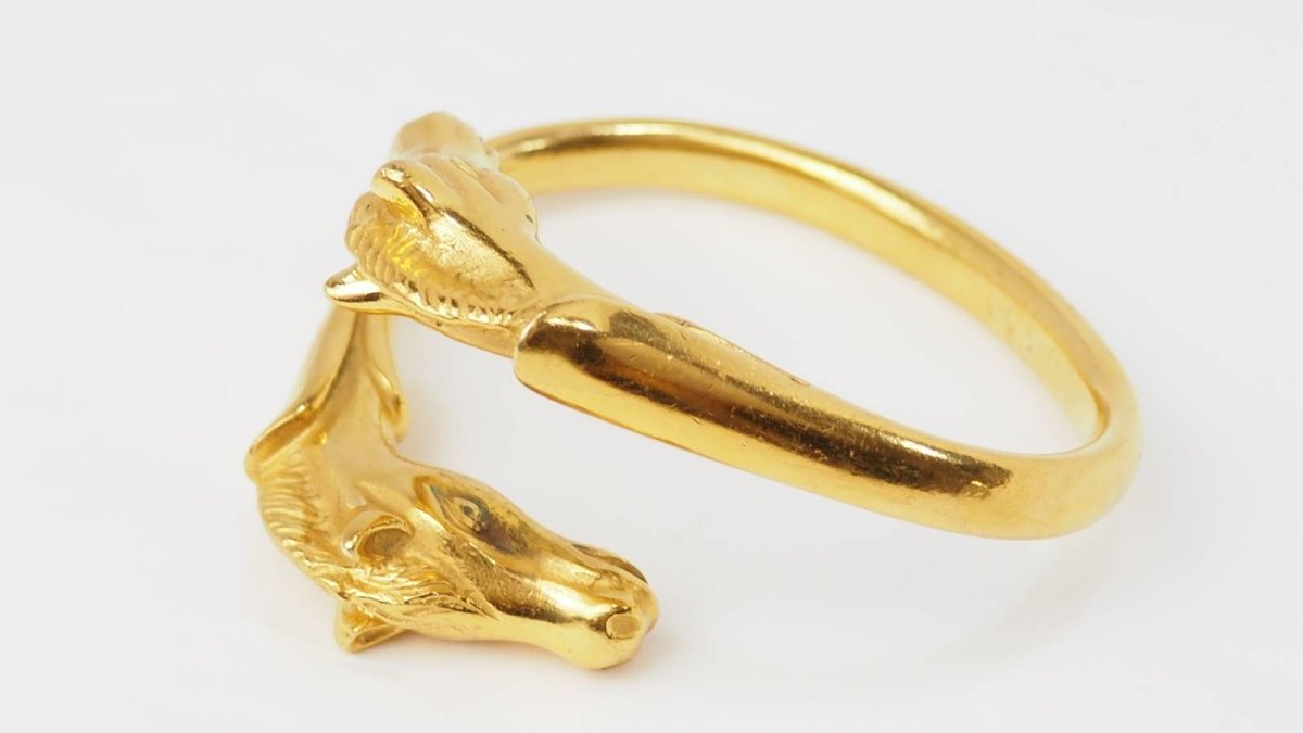 Hermès Bracelet Galop Têtes de chevaux plaqué Or - Maison Eloe