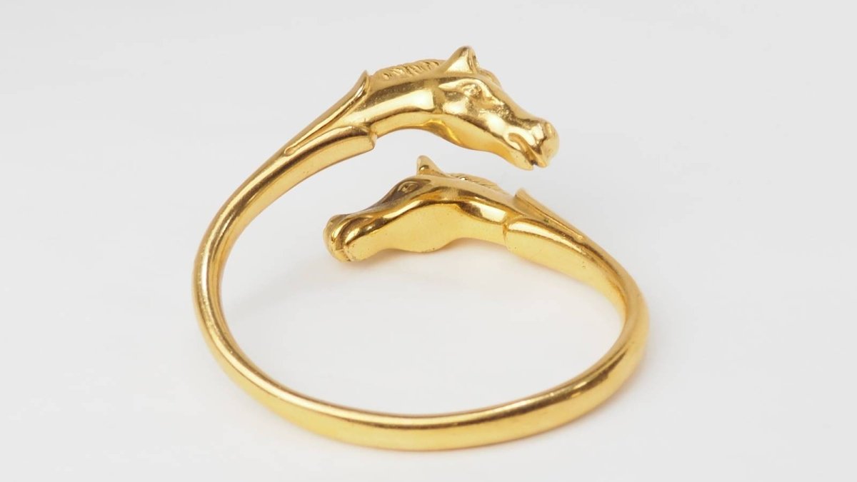 Hermès Bracelet Galop Têtes de chevaux plaqué Or - Maison Eloe