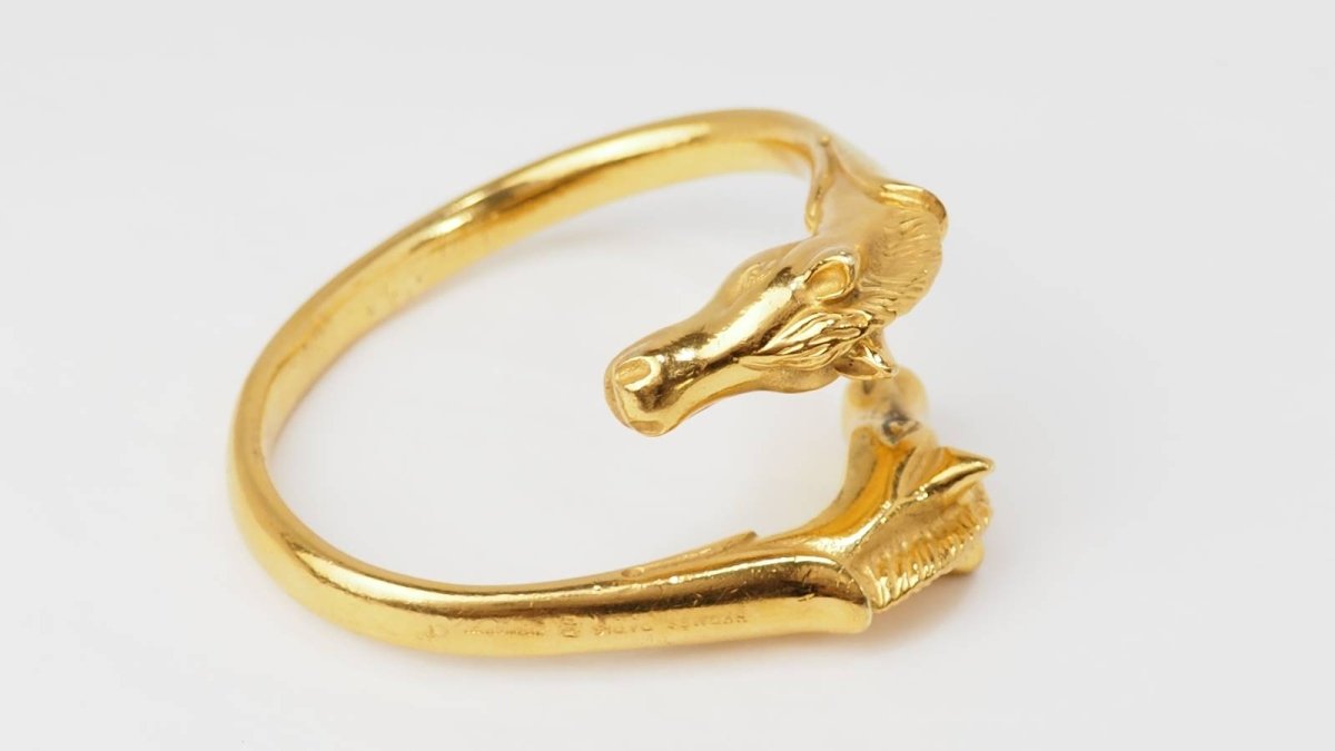 Hermès Bracelet Galop Têtes de chevaux plaqué Or - Maison Eloe