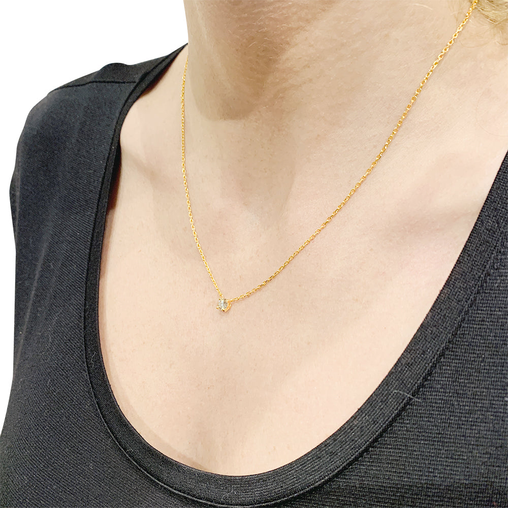 Cartier solitaire necklace, "1895", yellow gold.