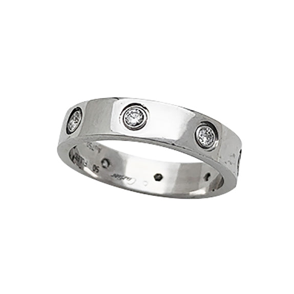 Alliance Cartier, "Love", or blanc, diamants.