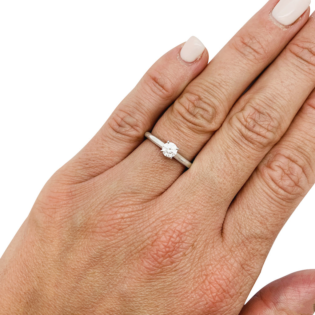 Cartier solitaire, "1895", 0.32 ct diamond, platinum.