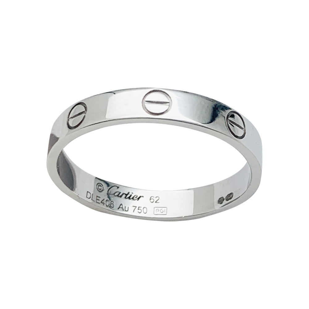 Bague Cartier, "Alliance Love", or blanc.