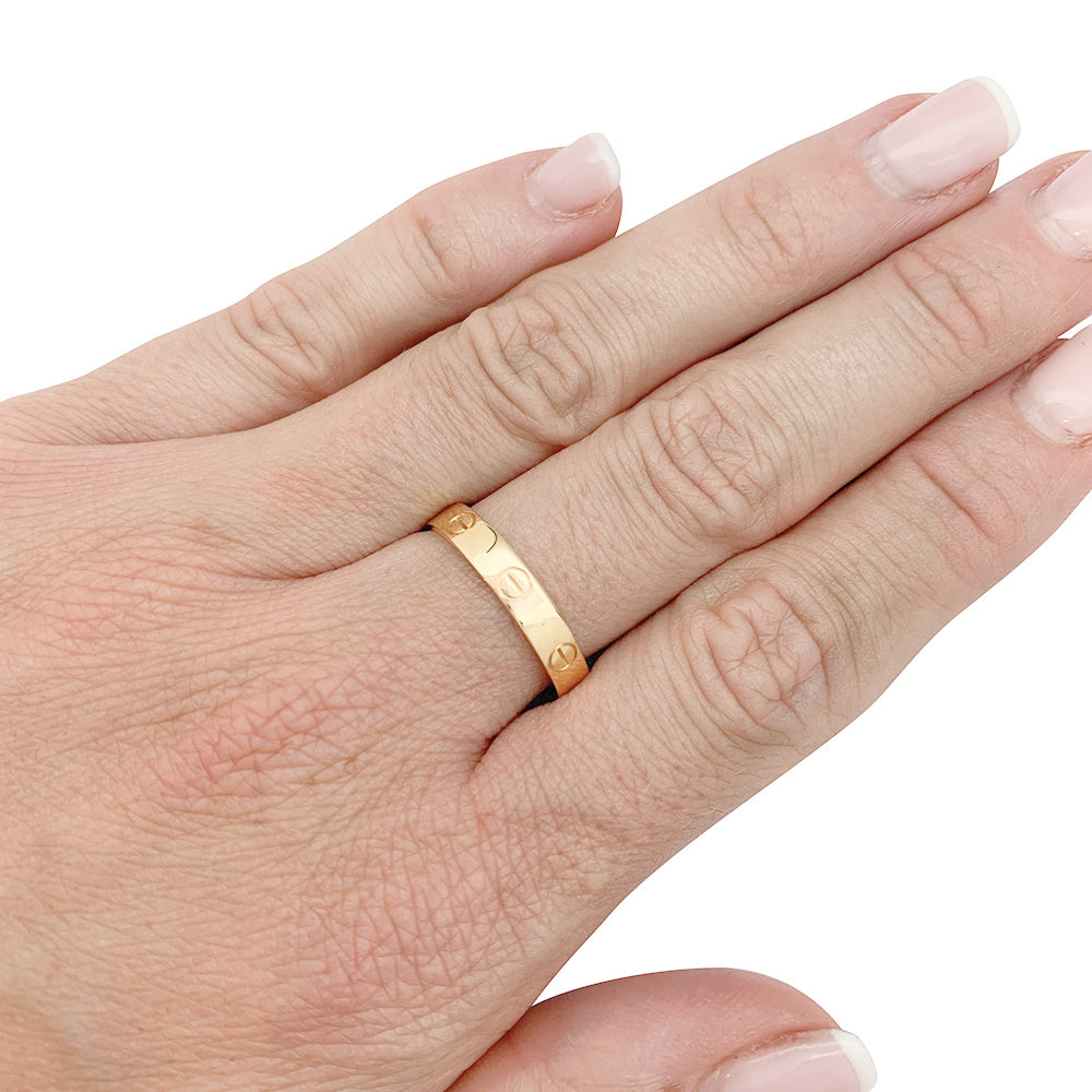 Bague Cartier, "Alliance Love", or rose.