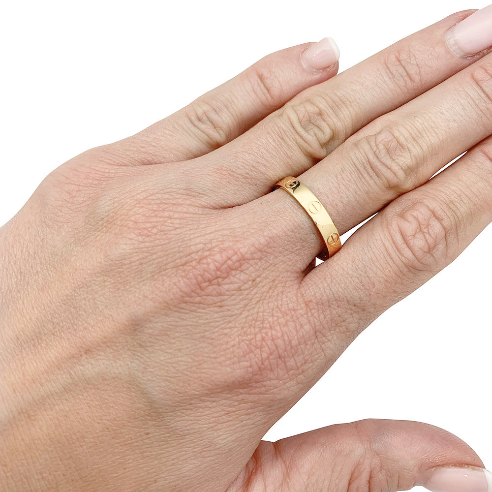 Bague Cartier, "Alliance Love", or rose.