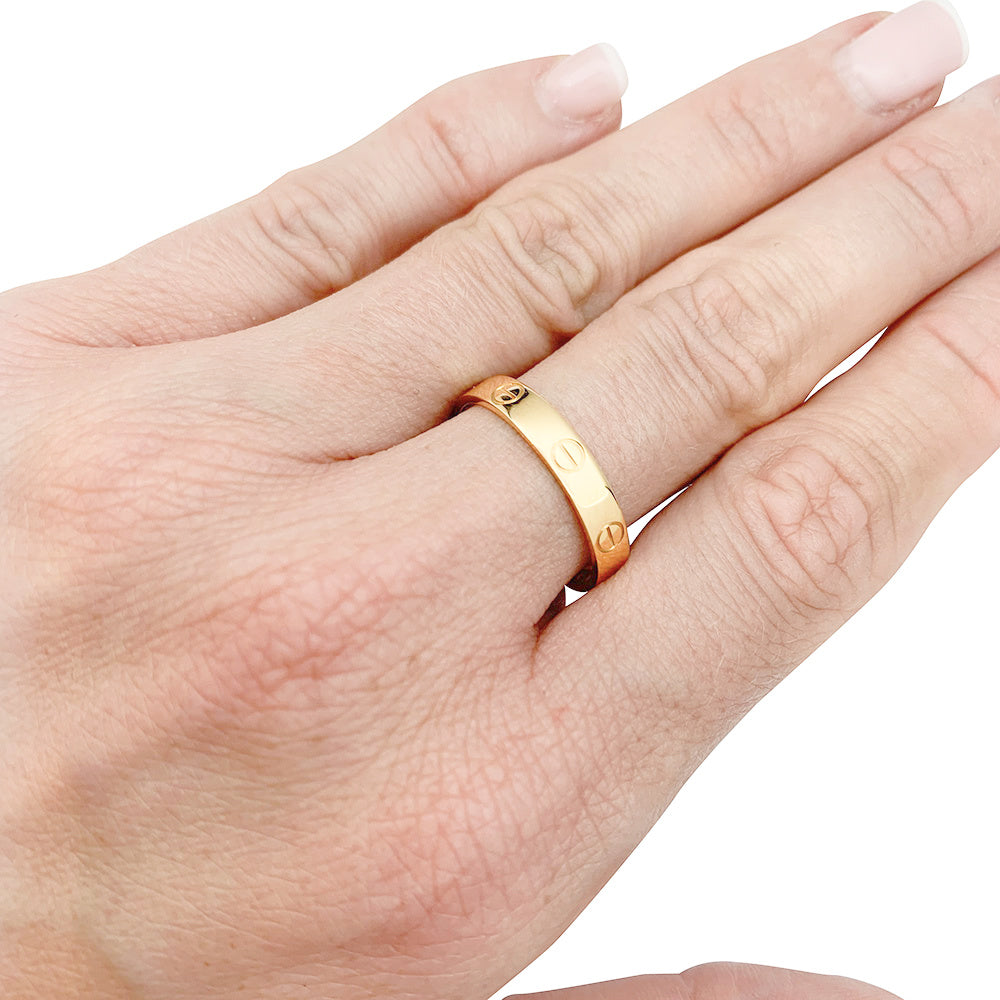 Bague Cartier, "Alliance Love", or rose.