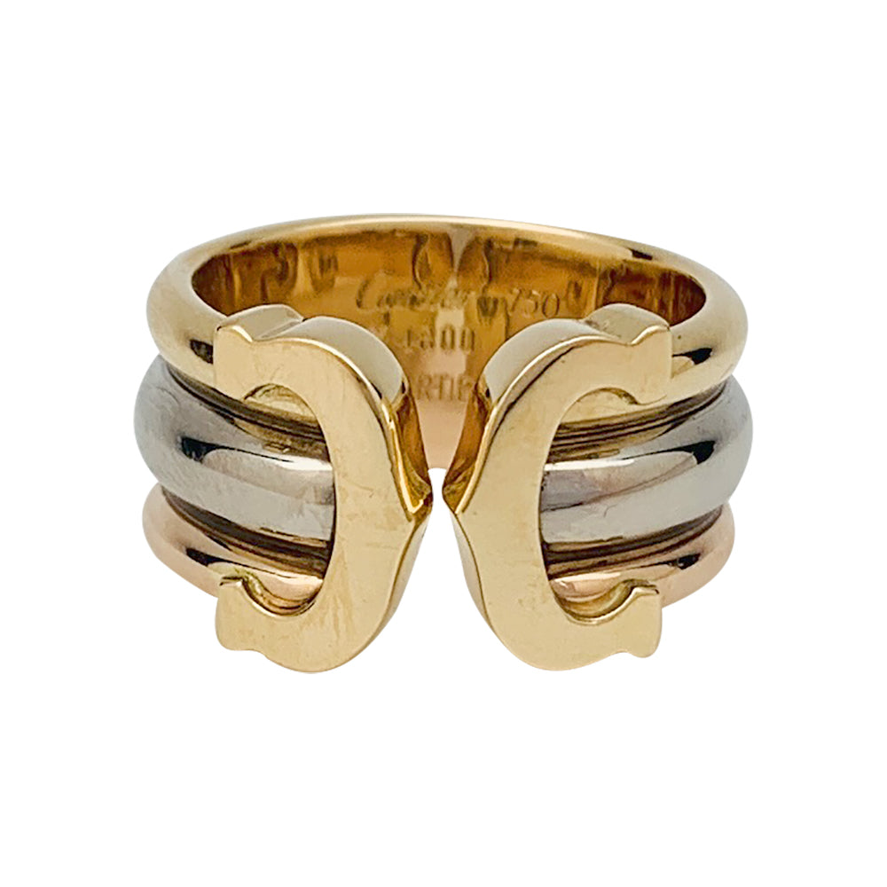 Bague Cartier, "C de Cartier", trois ors.