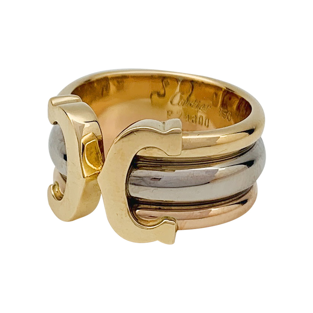 Bague Cartier, "C de Cartier", trois ors.