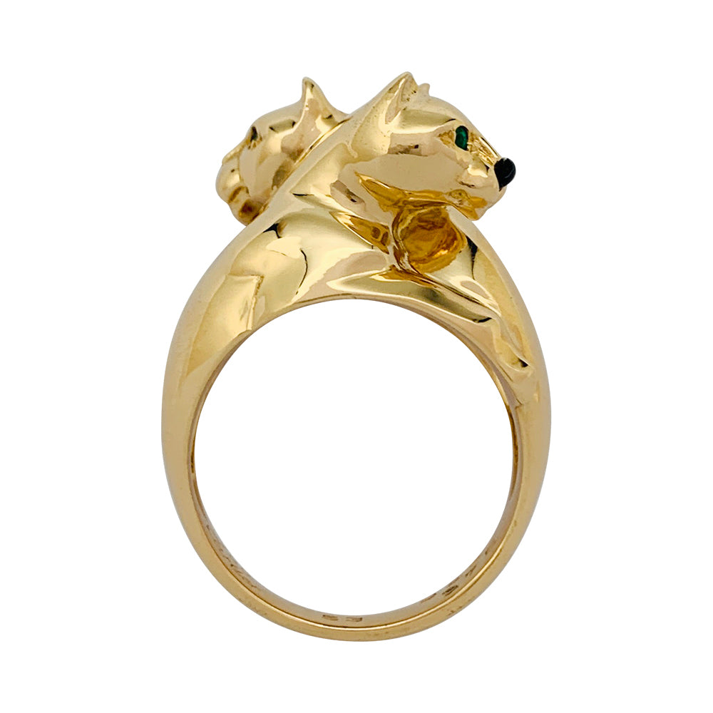 Bague Cartier, "Kozra", en or jaune, émeraude, onyx.