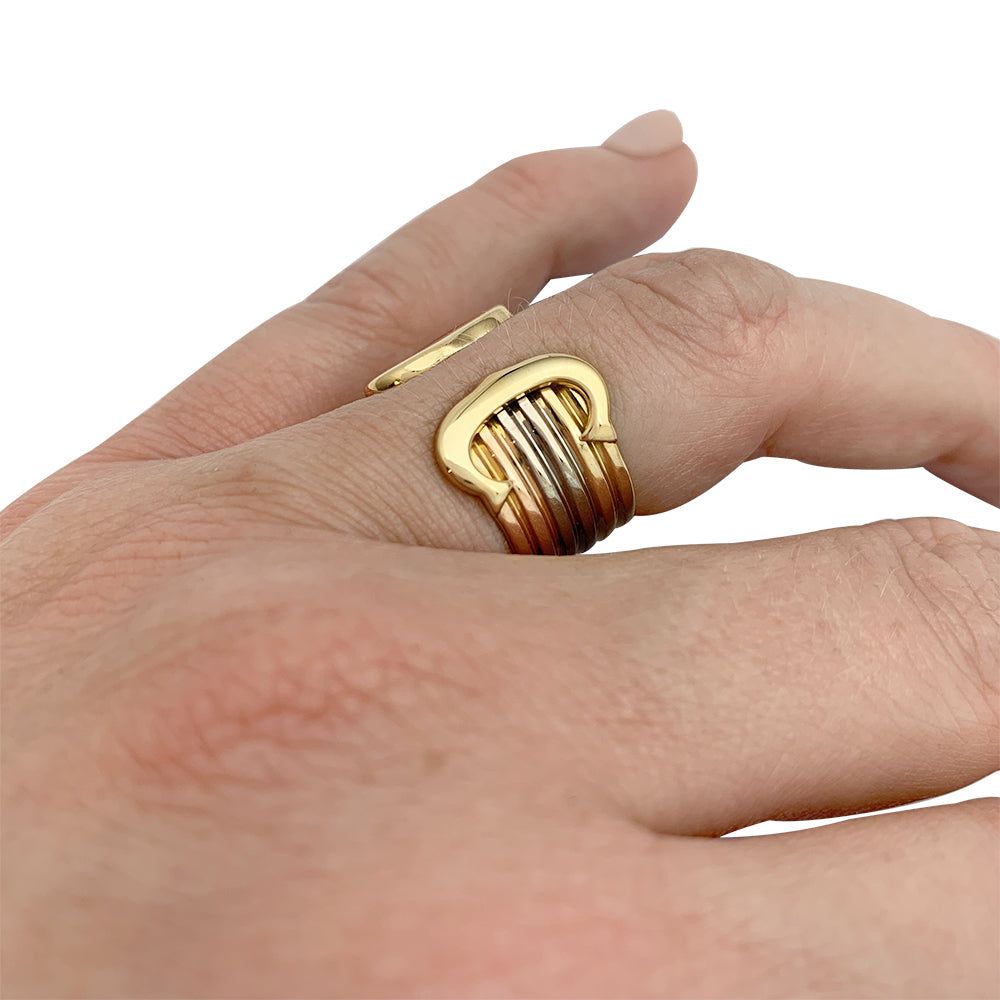 Bague Cartier vintage, "Double C", trois ors.