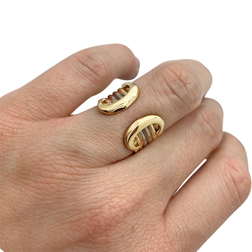 Bague Cartier vintage, "Double C", trois ors.