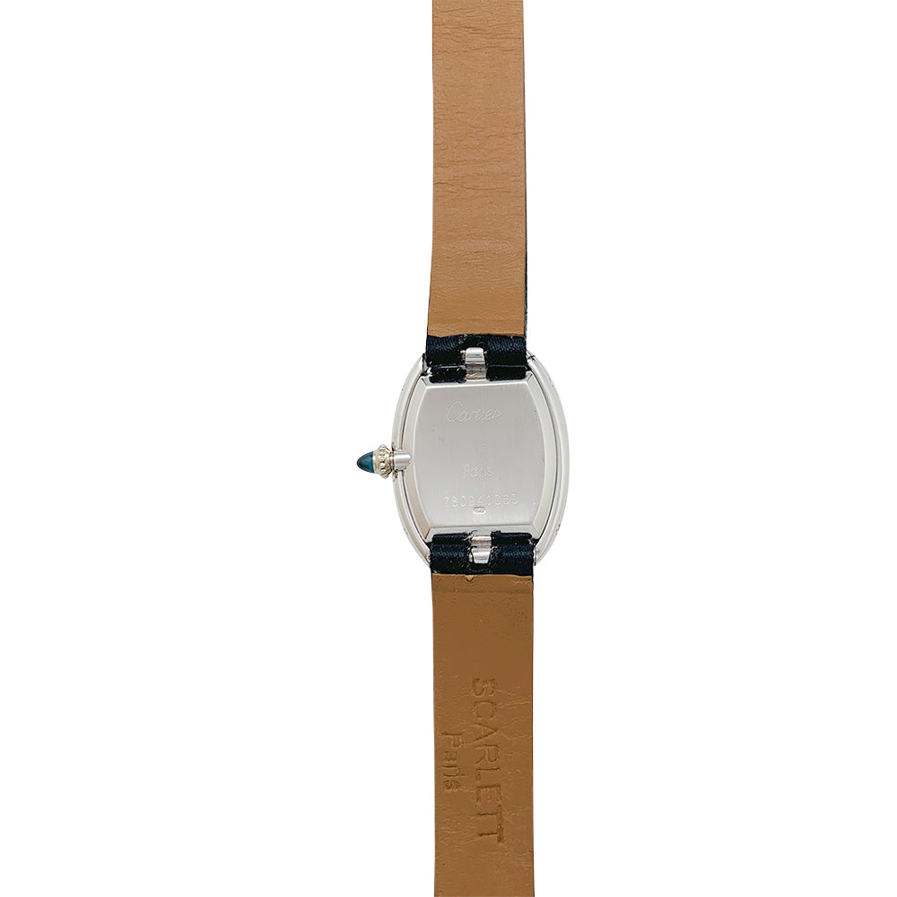 Cartier "Baignoire" model watch in white gold on leather.