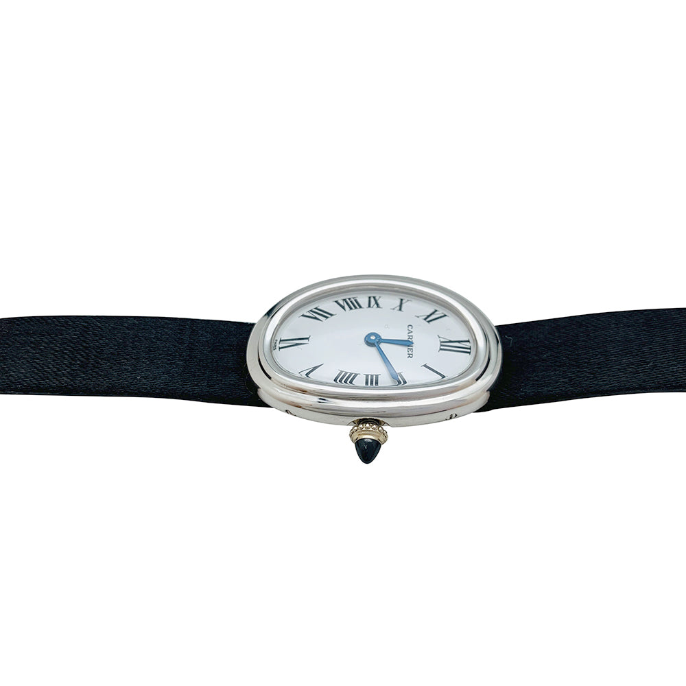 Cartier "Baignoire" model watch in white gold on leather.