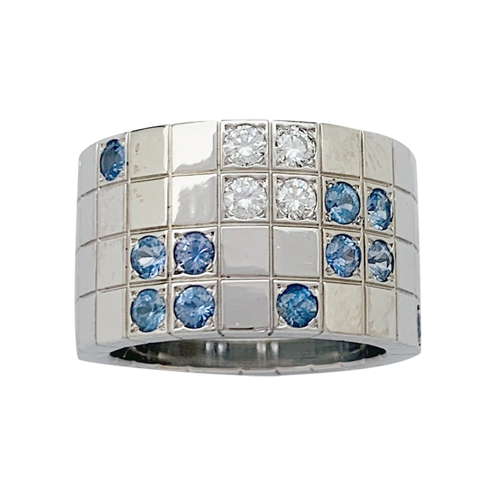 Bague Cartier "Lanière" en or blanc, diamants et saphirs.
