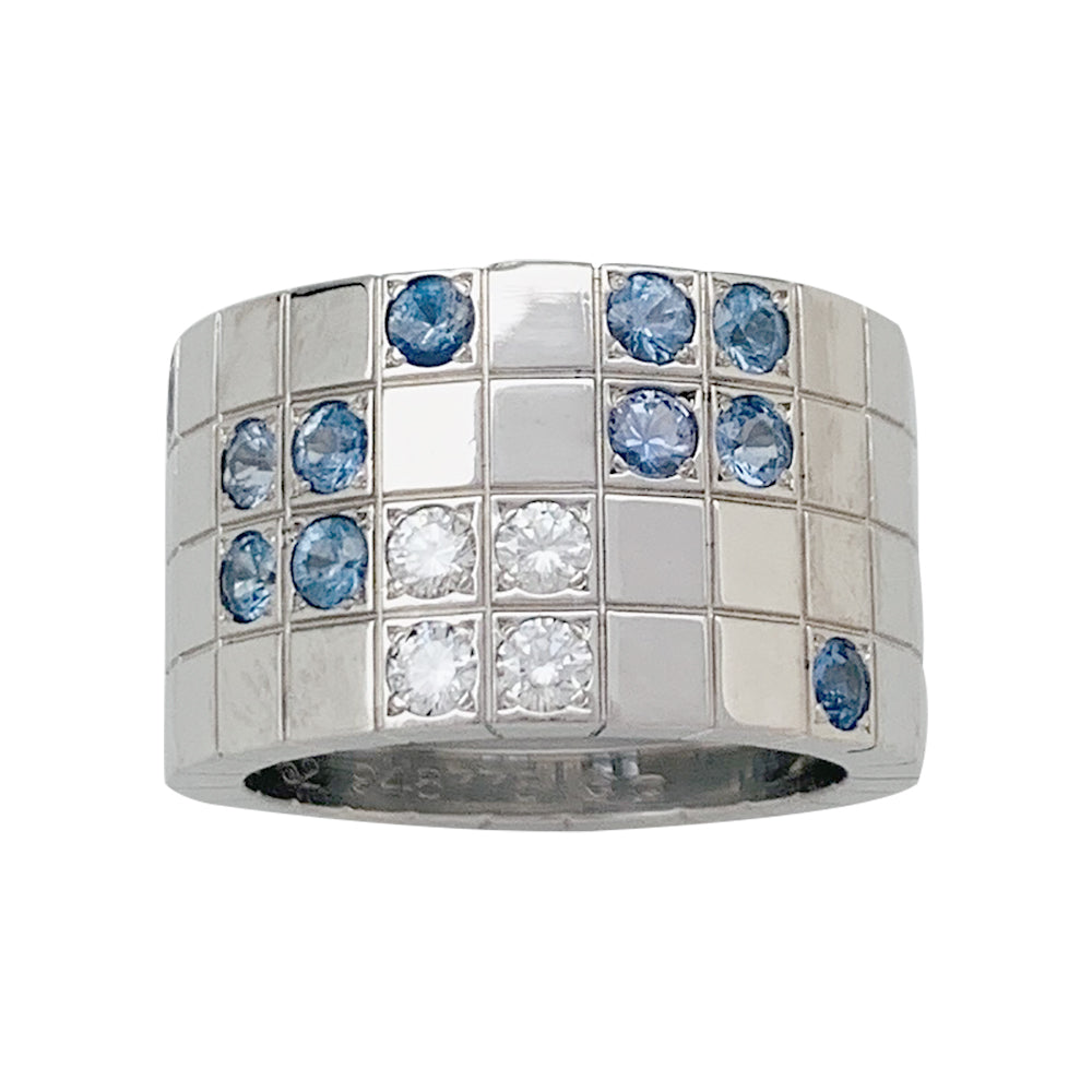 Bague Cartier "Lanière" en or blanc, diamants et saphirs.