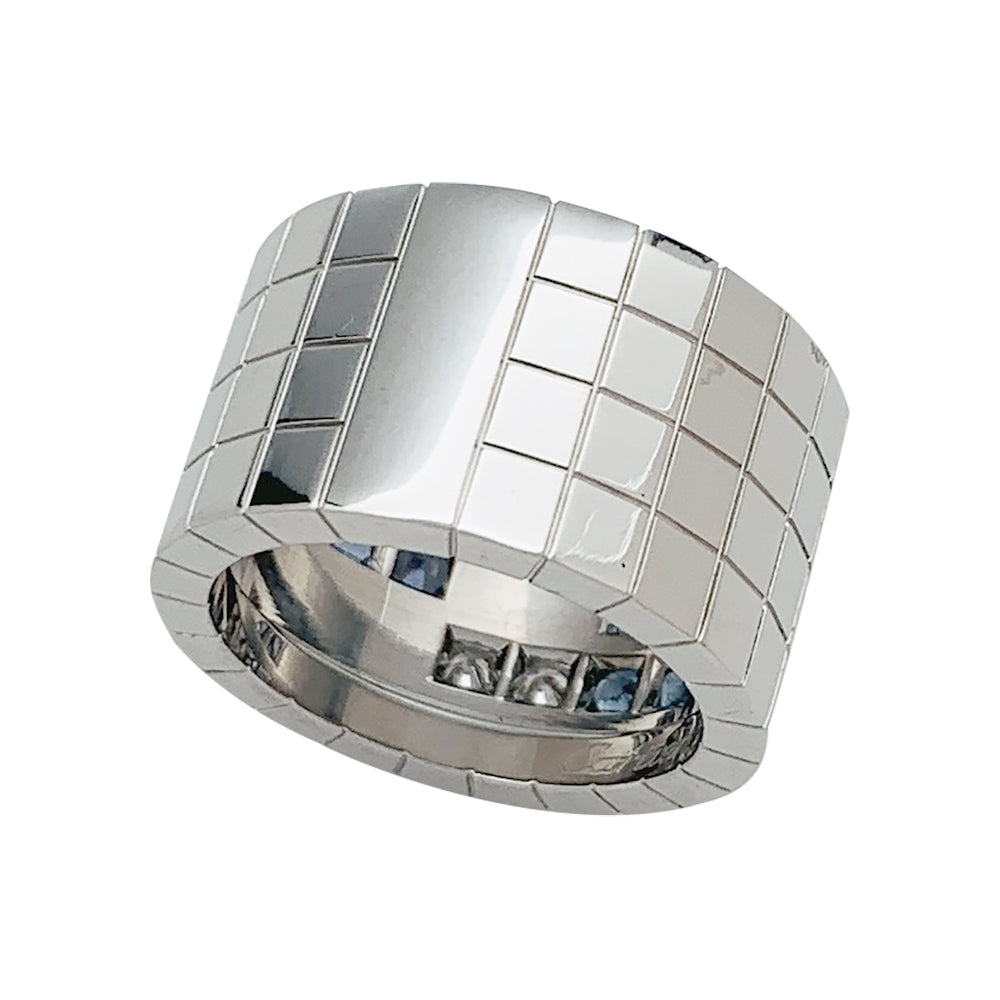 Bague Cartier "Lanière" en or blanc, diamants et saphirs.