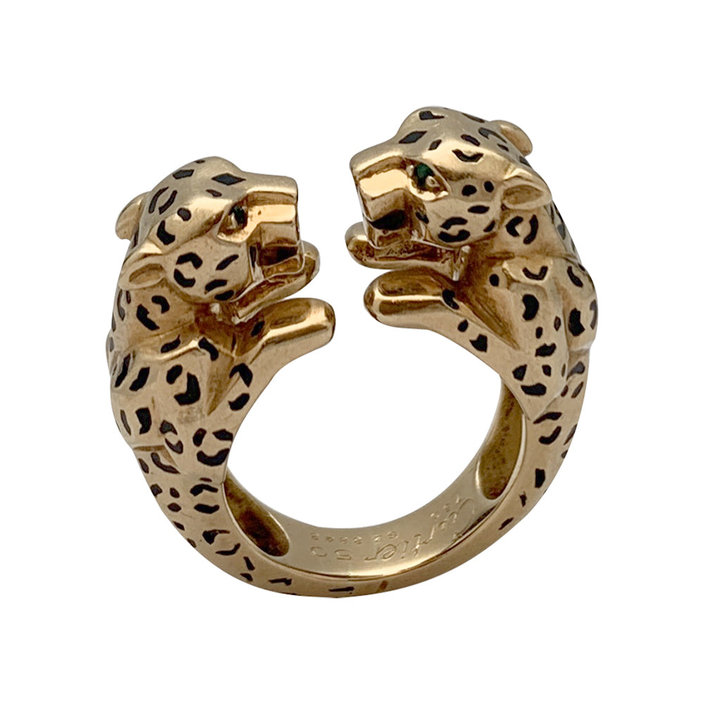 Bague Cartier, "Naïra", or jaune, émail, émeraudes.