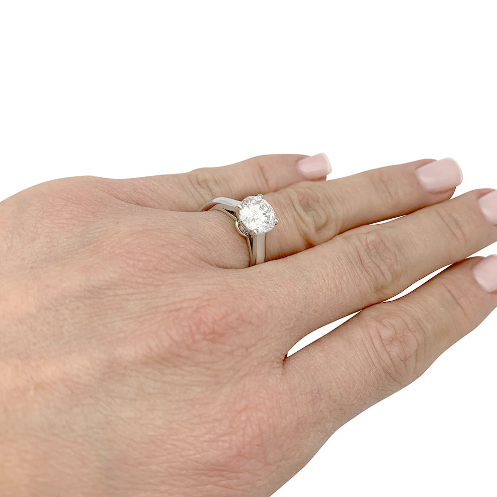 Cartier solitaire, "1895", platinum.