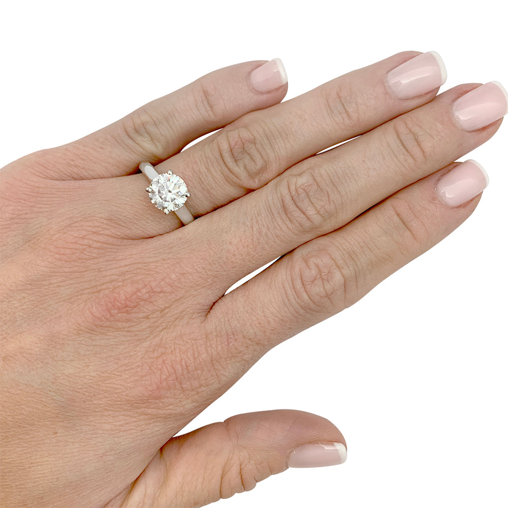 Cartier solitaire, "1895", platinum.