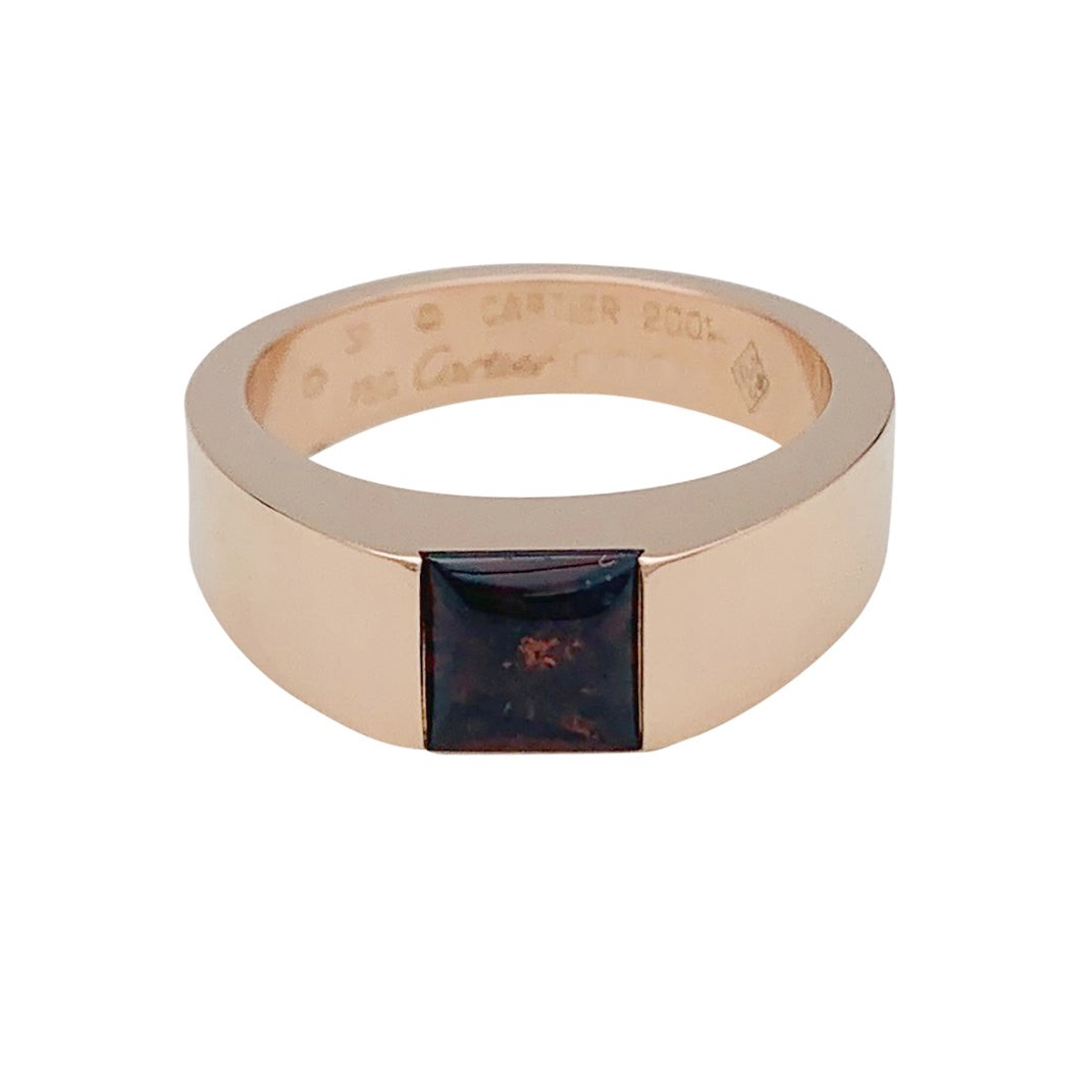 Bague Cartier, "Tank", or rose, grenat.