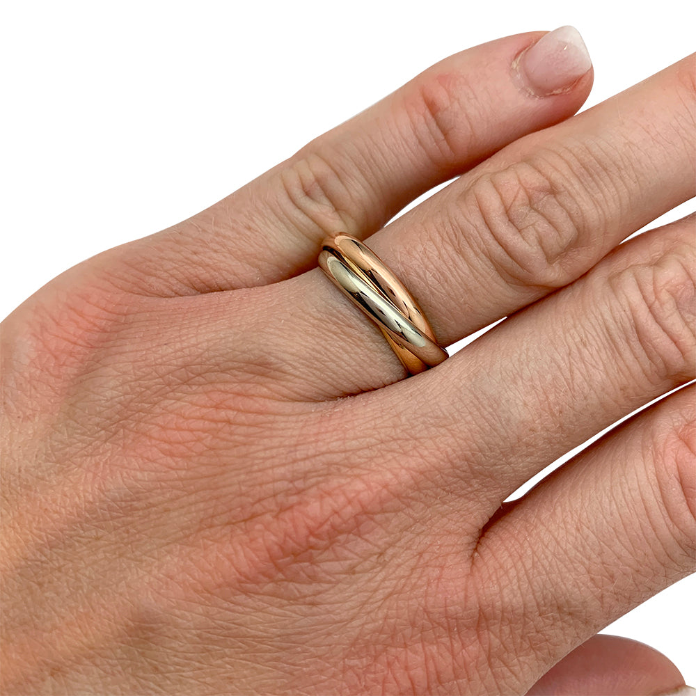 Bague Cartier, "Trinity", trois ors, petit modèle.