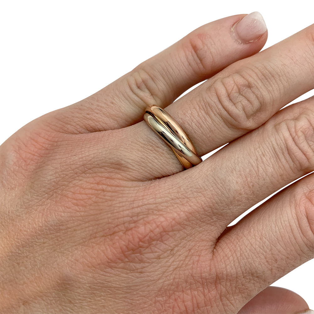 Bague Cartier, "Trinity", trois ors, petit modèle.