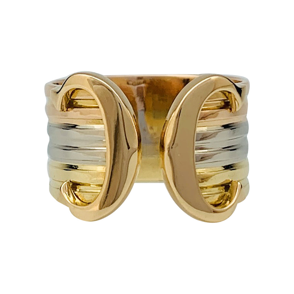 Bague Cartier vintage, "Double C", trois ors.