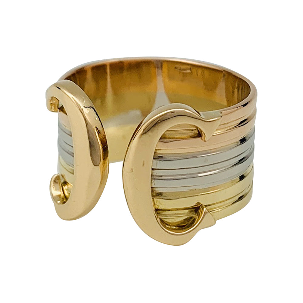 Bague Cartier vintage, "Double C", trois ors.